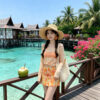 Long-sleeved and short-skirt split-body swimsuit for the beach