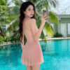 Neck-hugging swimsuit with gathered waist to show a slim silhouette