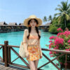 Long-sleeved and short-skirt split-body swimsuit for the beach